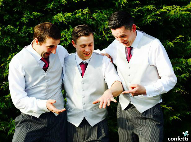 A groom and two groomsmen in smart casual attire | Confetti.co.uk