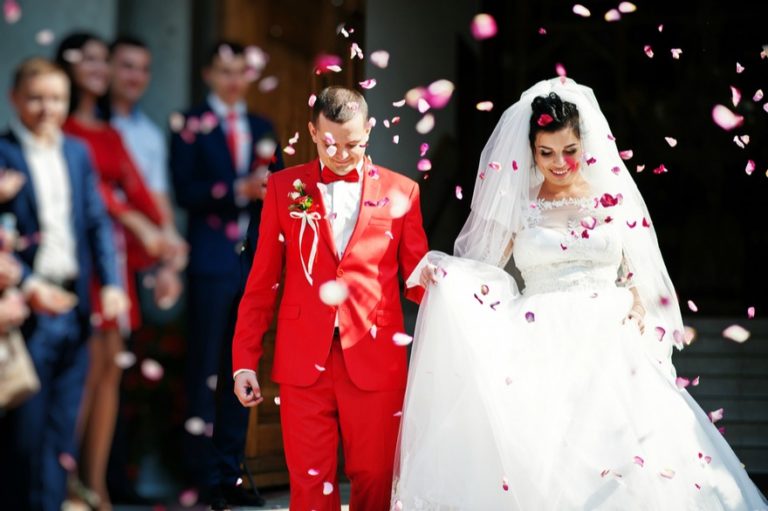 Confetti being thrown over the bride and groom | Confetti.co.uk