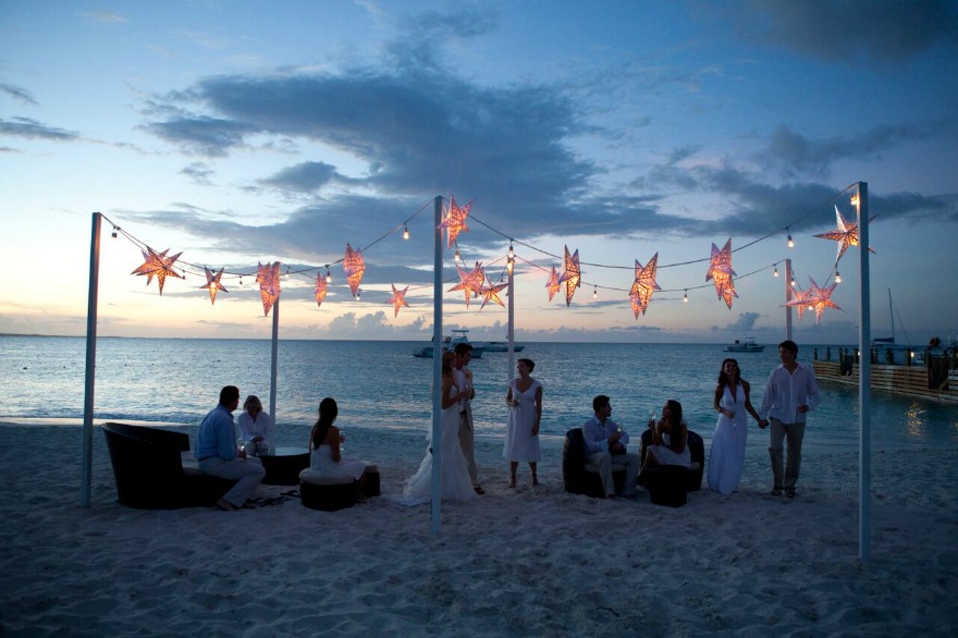 Sandals beach wedding after dark | Confetti.co.uk