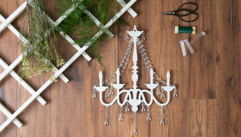 DIY Rustic Glam Chandelier and Fern Overhang Thumbnail | Confetti.co.uk