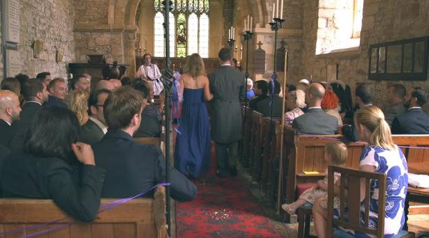 Bride walking down the aisle | Confetti.co.uk