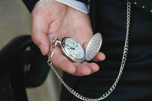 Pocket Watch in hand | Confetti.co.uk