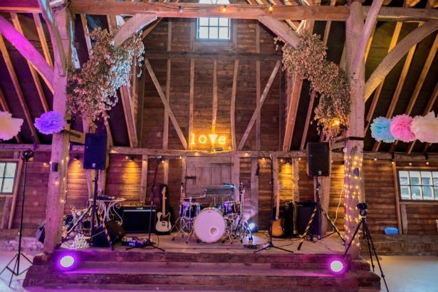 Warble Entertainment band set up in barn | Confetti.co.uk