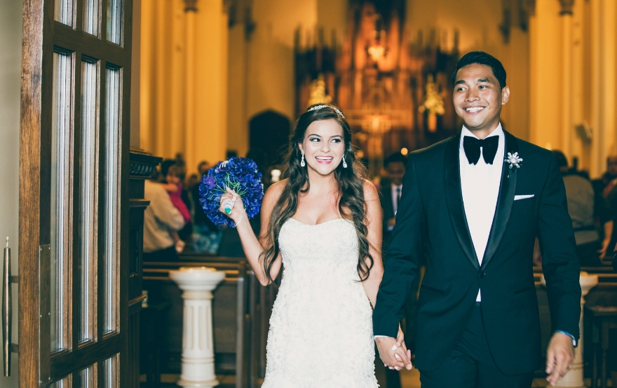 newlyweds leaving wedding ceremony