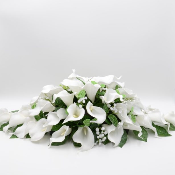 A bridal bouquet of lily artifical flowers by Petals Polly | Confetti.co.uk