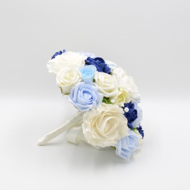 A bridal bouquet of roses in artifical flowers by Petals Polly | Confetti.co.uk