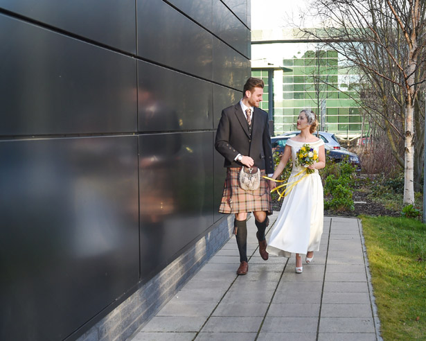 Bride and Groom outside of The Village Hotel Edinburgh | Confetti.co.uk