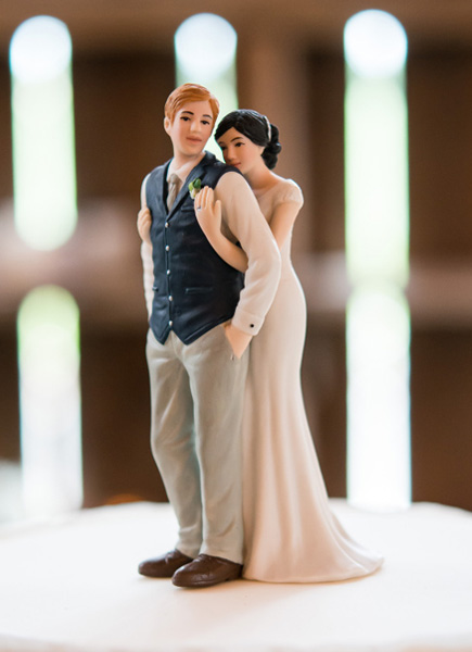 A Sweet Embrace Bride Embracing Groom Couple Figurine Charming Rustic Wedding Cake Topper Inspiration | Confetti.co.uk