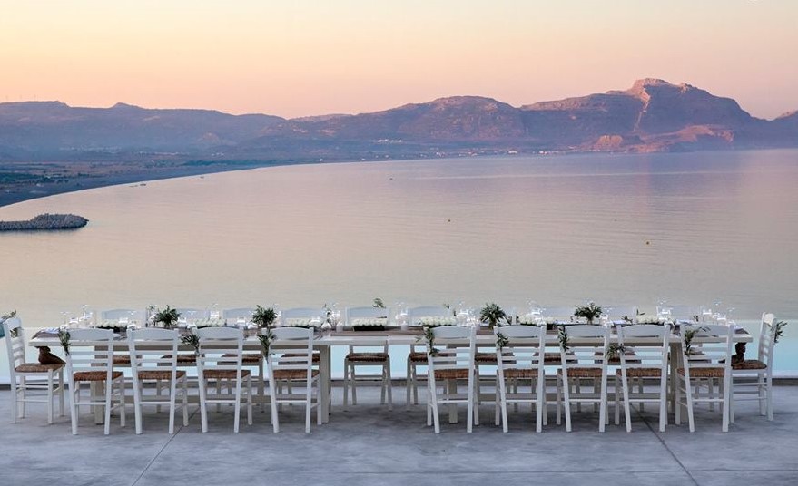 Wedding table at sunset with Greek Dream Planner | Confetti.co.uk