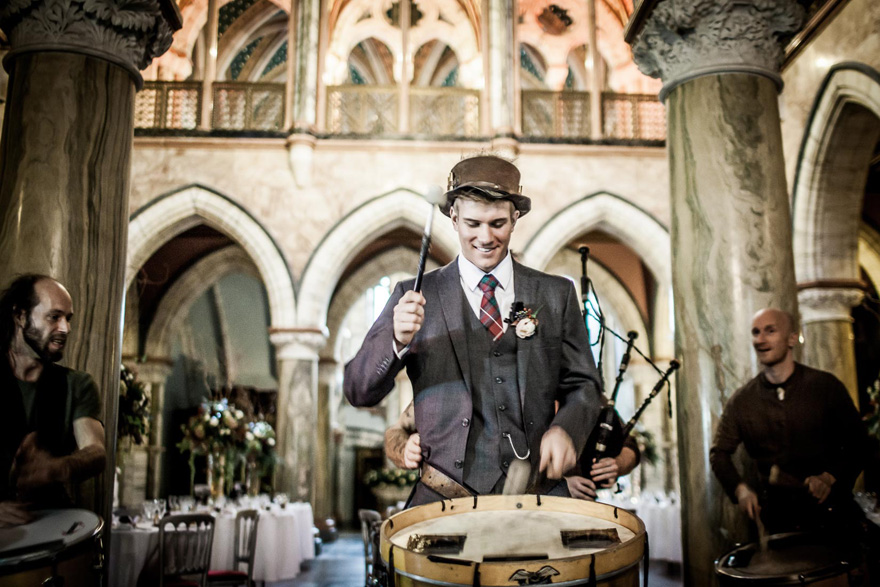 Marble Hall – Taken during the drinks reception - Caledonia Band were playing and gave the groom an opportunity to become an honorary member of the band - by vanishingmomentsphotography