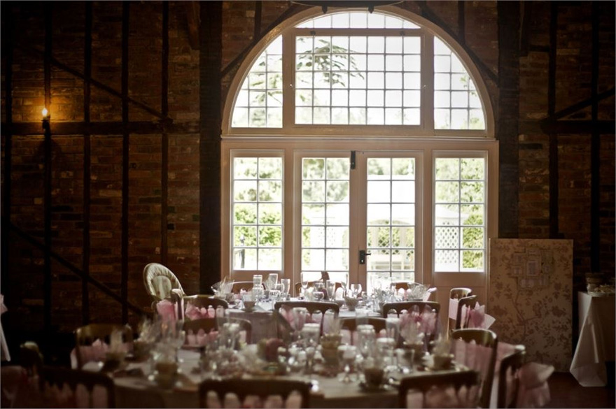 The Coach House at Marks Hall Reception Room and Garden Through the Windows | Confetti.co.uk