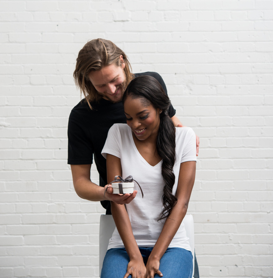 Man Giving a Gift Box to His Girlfriend | Confetti.co.uk