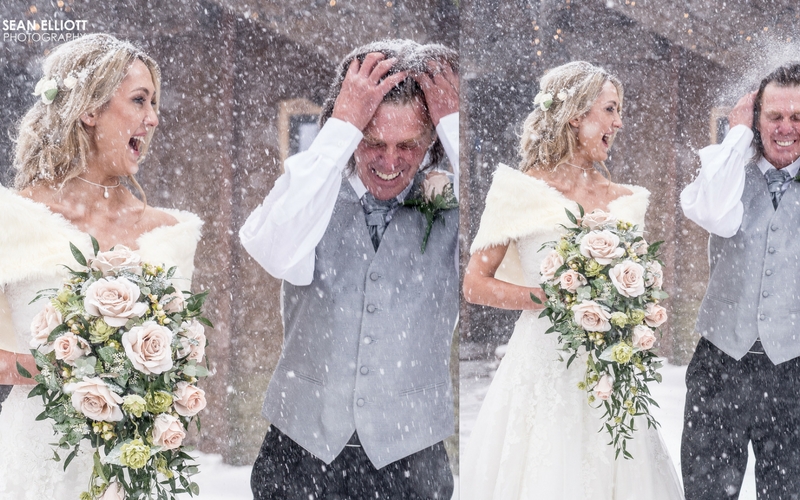 Jemma and Steve pose in the snowy weather