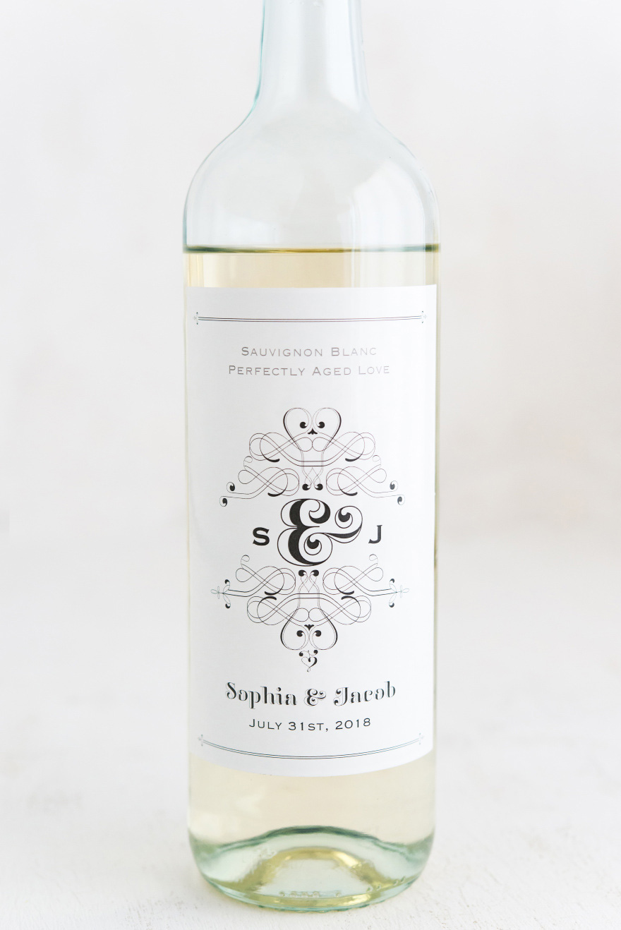 Black and White Fanciful Monogram Wine Label Stylized Pattern with Versatile Format | Confetti.co.uk