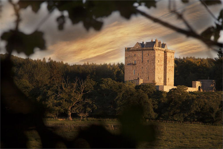 Borthwick Castle near Edinburgh, Scotland - Medieval Scottish Castle - Castle Sunset Photography - Story Book Wedding Venues | Confetti.co.uk