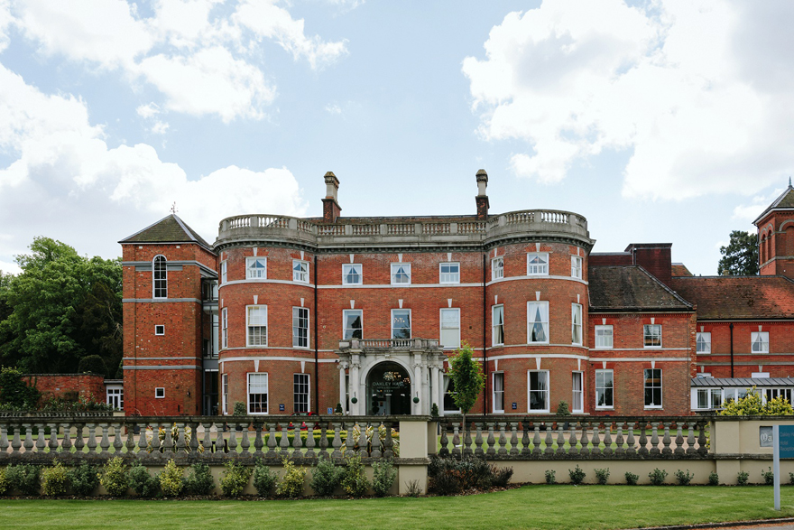 Oakley Hall Park and Hotel Grand Wedding Venue in the UK in Basingstoke, North Hampshire, England - Beautiful Vintage Red Brick Wedding Venue in England - Jacques Lloyd Real Simple Photography | Confetti.co.uk