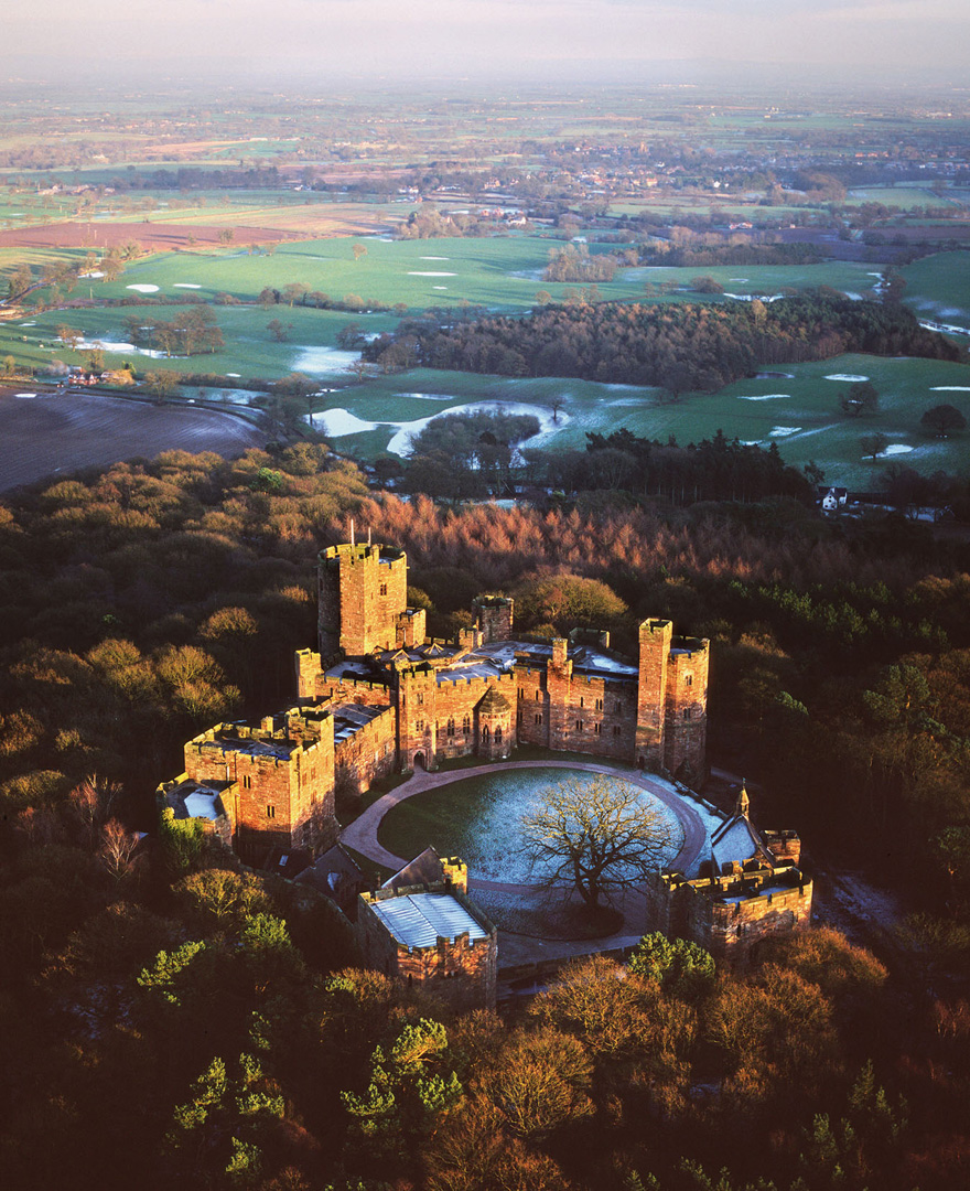 Peckforton Castle Cheshire Wedding Venue - Medieval Castle Style Victorian Country House - Castle Winter Sunset - Castle Wedding Venues in the UK | Confetti.co.uk