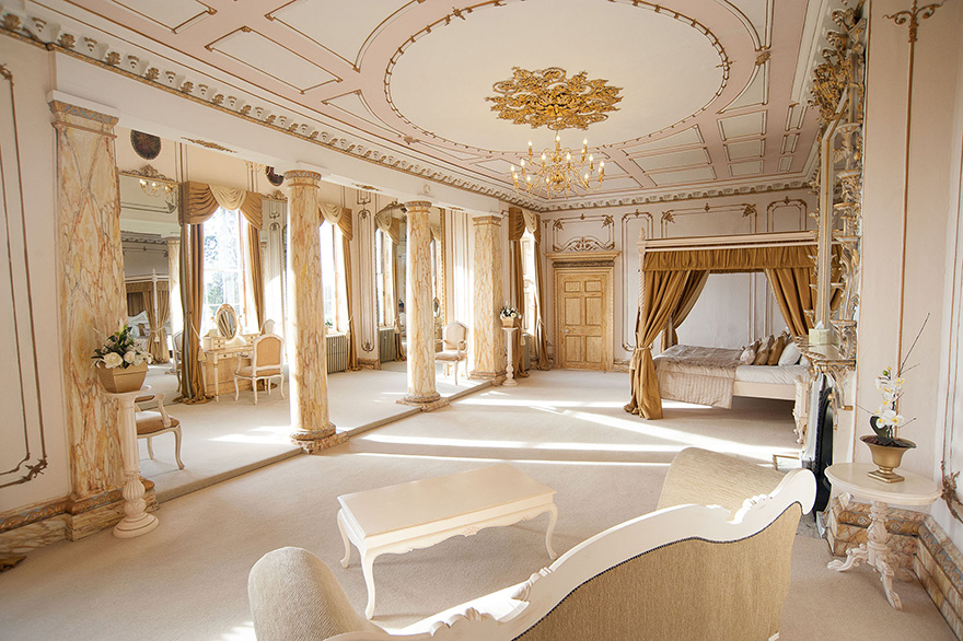 Gosfield Hall Grand Wedding Venue in Gosfield, Essex - Luxury White and Gold "Rococo" Bridal Suite Bedroom | Confetti.co.uk