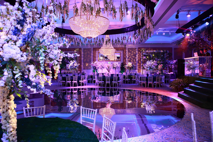 Vibrant Meridian Grand Ballroom Banquet Hall and Wedding Reception Room with Hanging Flowers and Central Wedding Reception Dance Floor | Confetti.co.uk