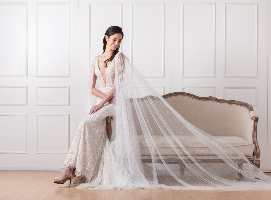 Alternative wedding dress with cape