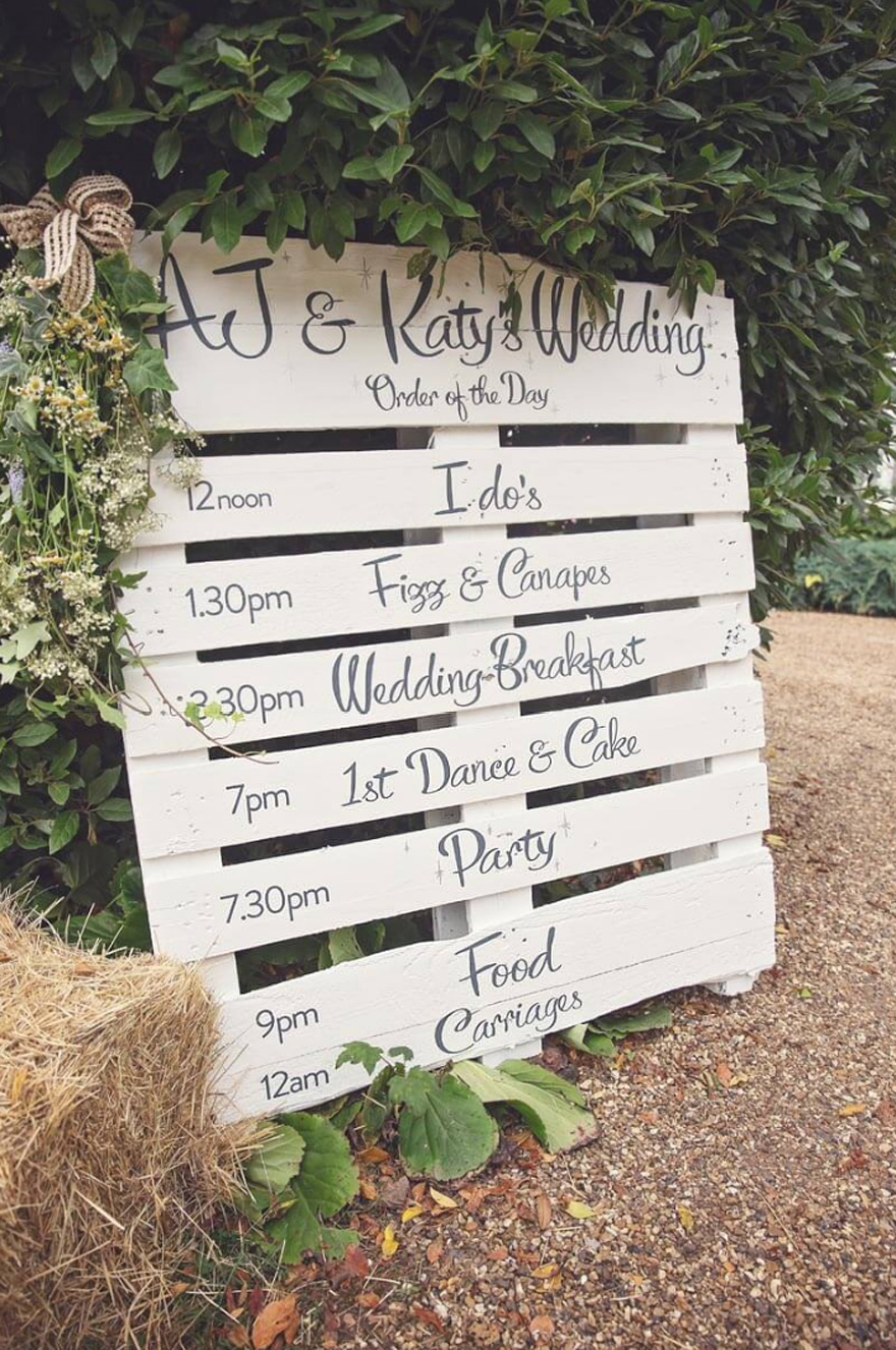 Marquee Wedding from Energy Photographic - Wedding Timeline Sign Ideas - Best Wedding Signs - Pallet Wedding Sign - DIY Wedding Signs - Order of the Day Wedding Ideas | Confetti.co.uk