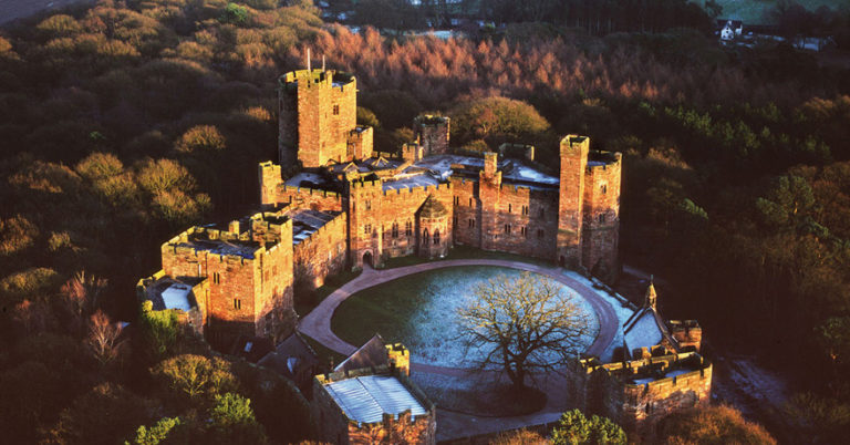 Peckforton Castle Cheshire Wedding Venue - Medieval Castle Style Victorian Country House - Castle Winter Sunset - Beautiful Wedding Venues in Cheshire | Confetti.co.uk