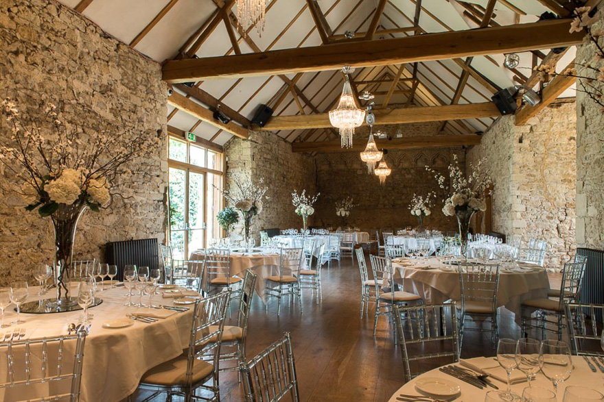 Beautiful Barn Wedding Venues in in Oxfordshire - Notley Abbey Historic Barn Wedding Venue - The Monks’ Refectory Rustic Glam Wedding Reception | Confetti.co.uk