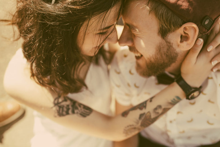 Tattooed Couple by By Hrecheniuk Oleksii on Shutterstock - How to Cover Up Tattoos for Your Wedding | Confetti.co.uk