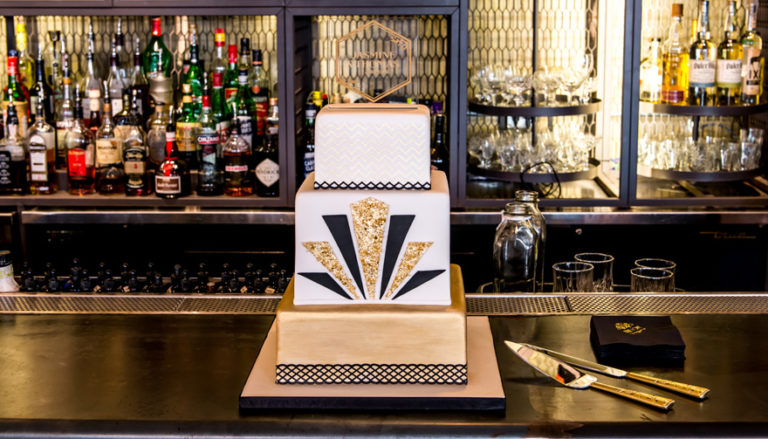 13 Stunning Metallic Wedding Cakes - Black and Gold Square Art Deco Cake | Confetti.co.uk