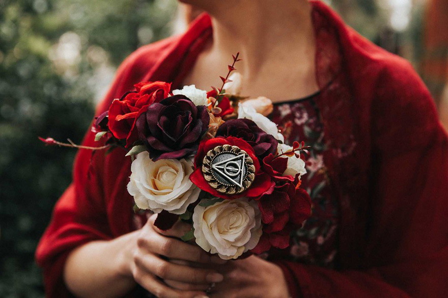 Harry Potter Bridal Bouquet Ideas - Alex and Matt's Harry Potter Wedding by Maddie Farris Photography - Deathly Hallows Symbol Charm | Confetti.co.uk