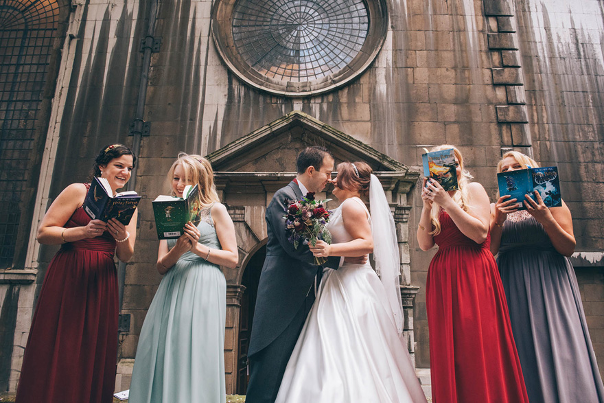 Harry Potter Bridesmaids - Reading Harry Potter - Wedding Photo by by Emma-Jane Photography | Confetti.co.uk