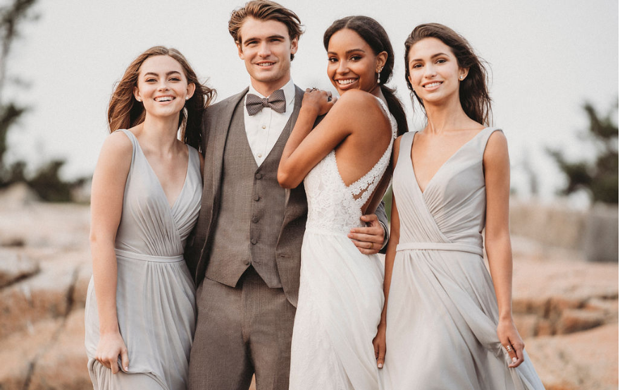 Bride and groom with bridesmaids