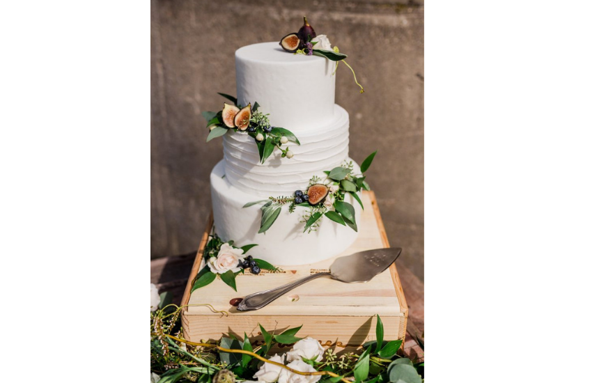 white wedding cake with figs