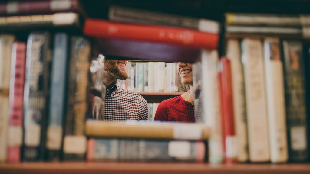 contemporary wedding readings - couple posing with books