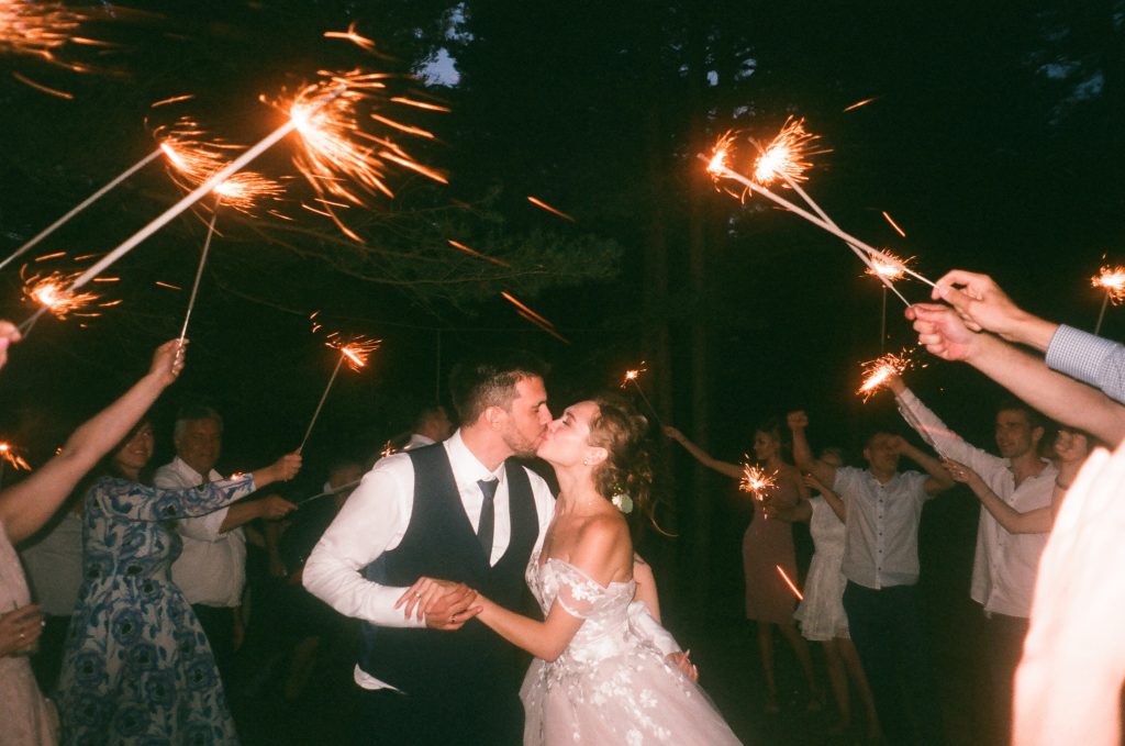 Bride and groom kissing during first dance