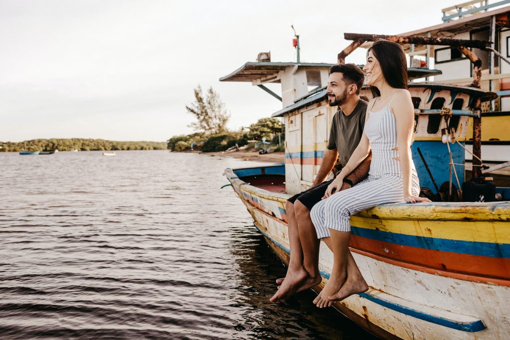 couple-on-boat-why-is-it-called-a-honeymoon